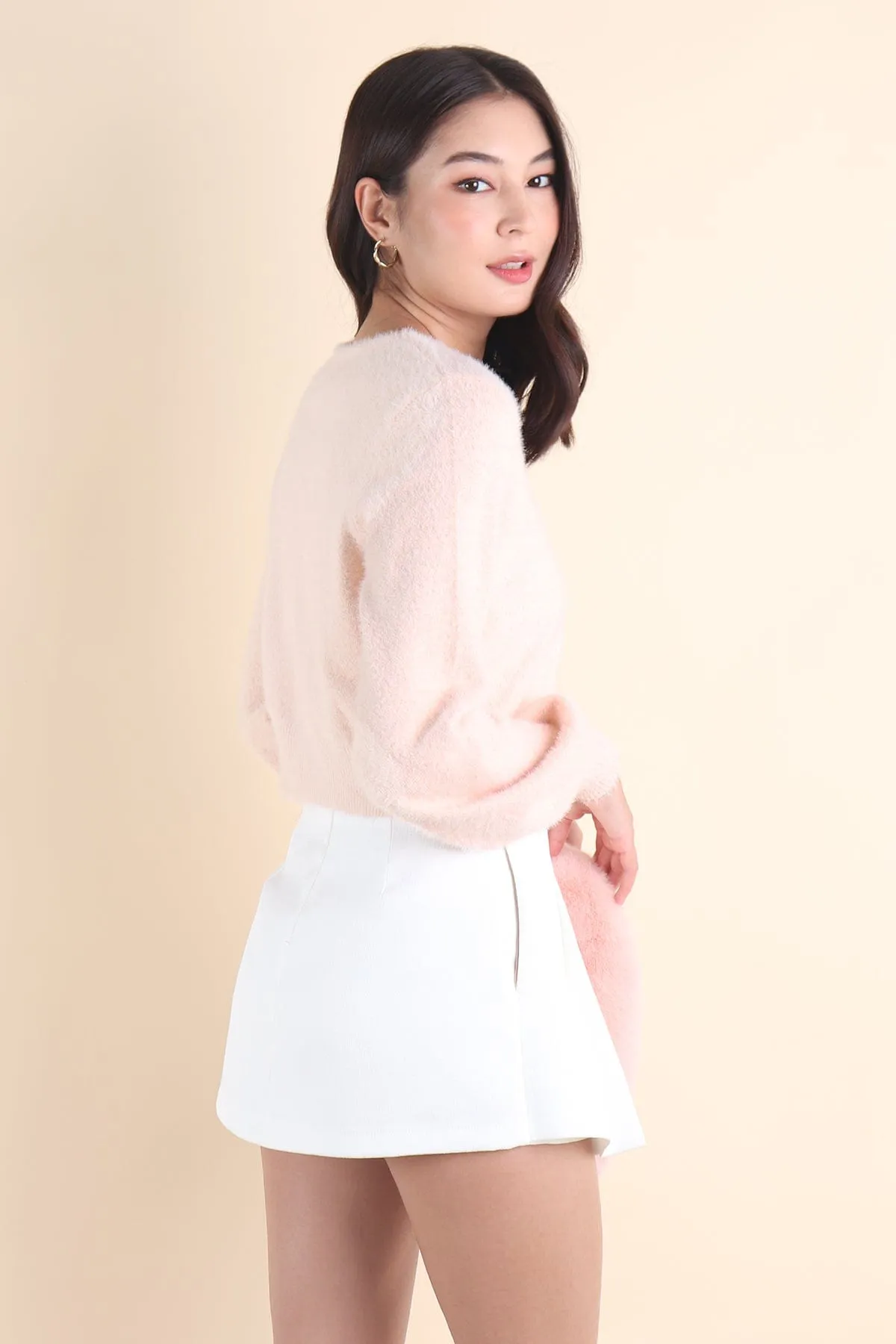 ELIZ BOW FURRY CARDIGAN IN PINK