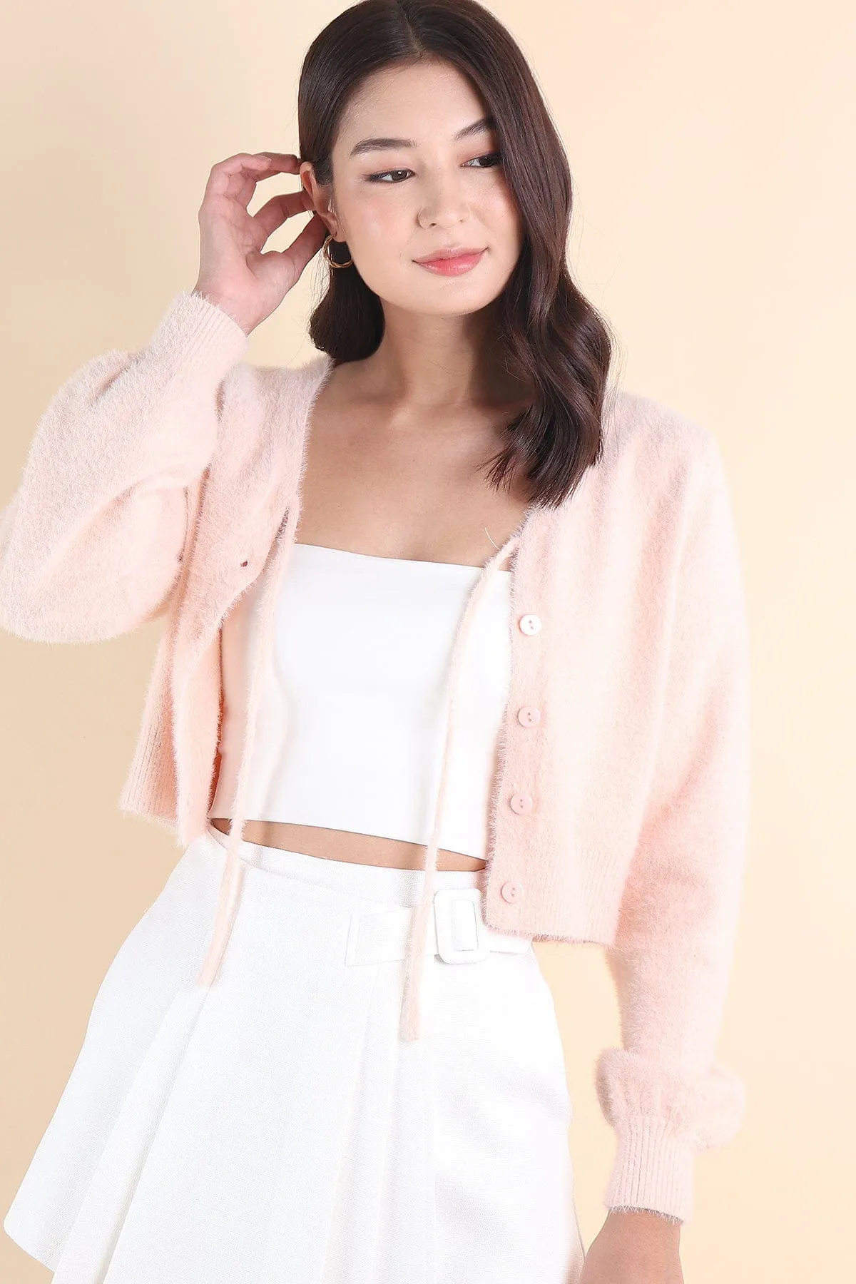 ELIZ BOW FURRY CARDIGAN IN PINK