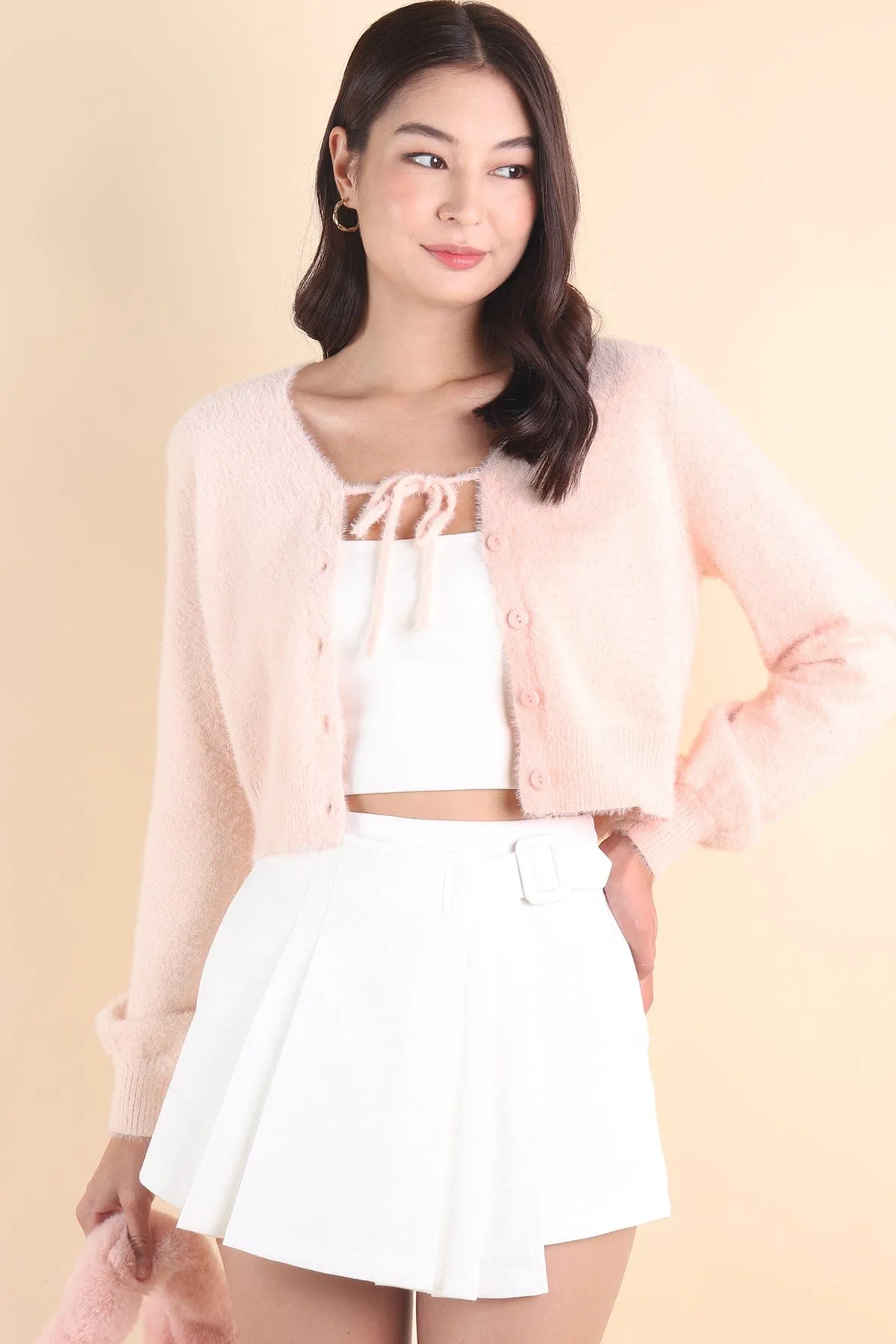 ELIZ BOW FURRY CARDIGAN IN PINK