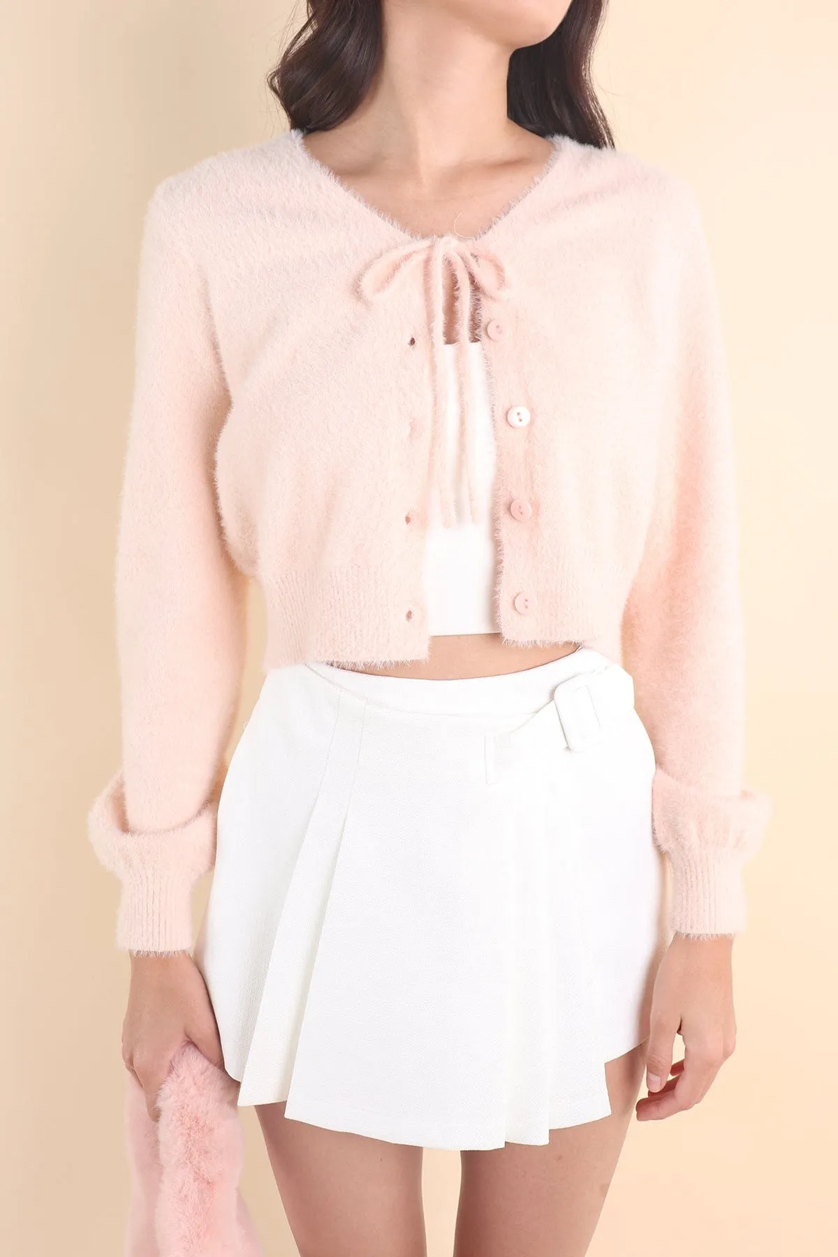 ELIZ BOW FURRY CARDIGAN IN PINK